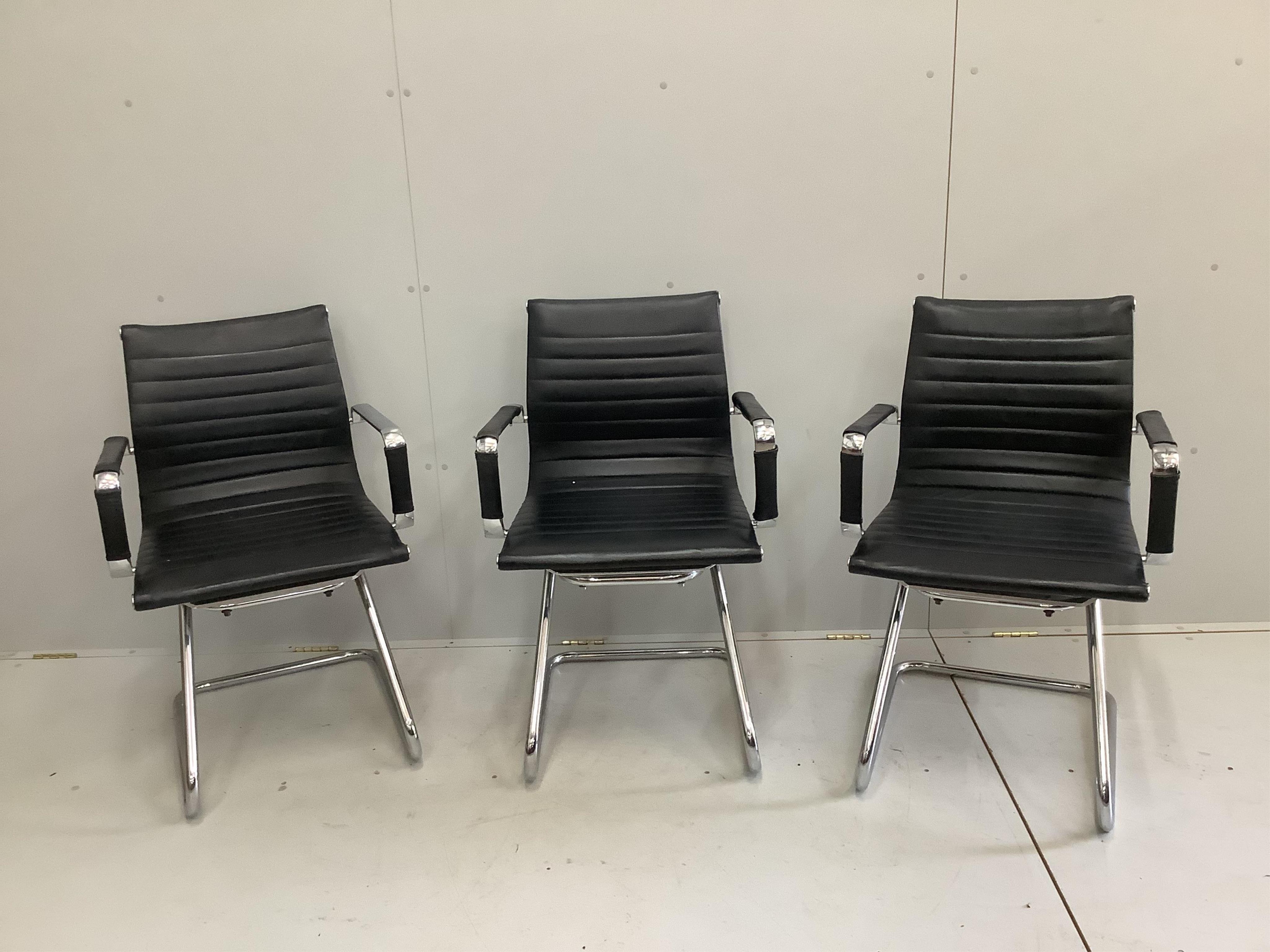 Seven chrome and black leather elbow chairs, width 57cm, depth 57cm, height 89cm. Condition - poor to fair